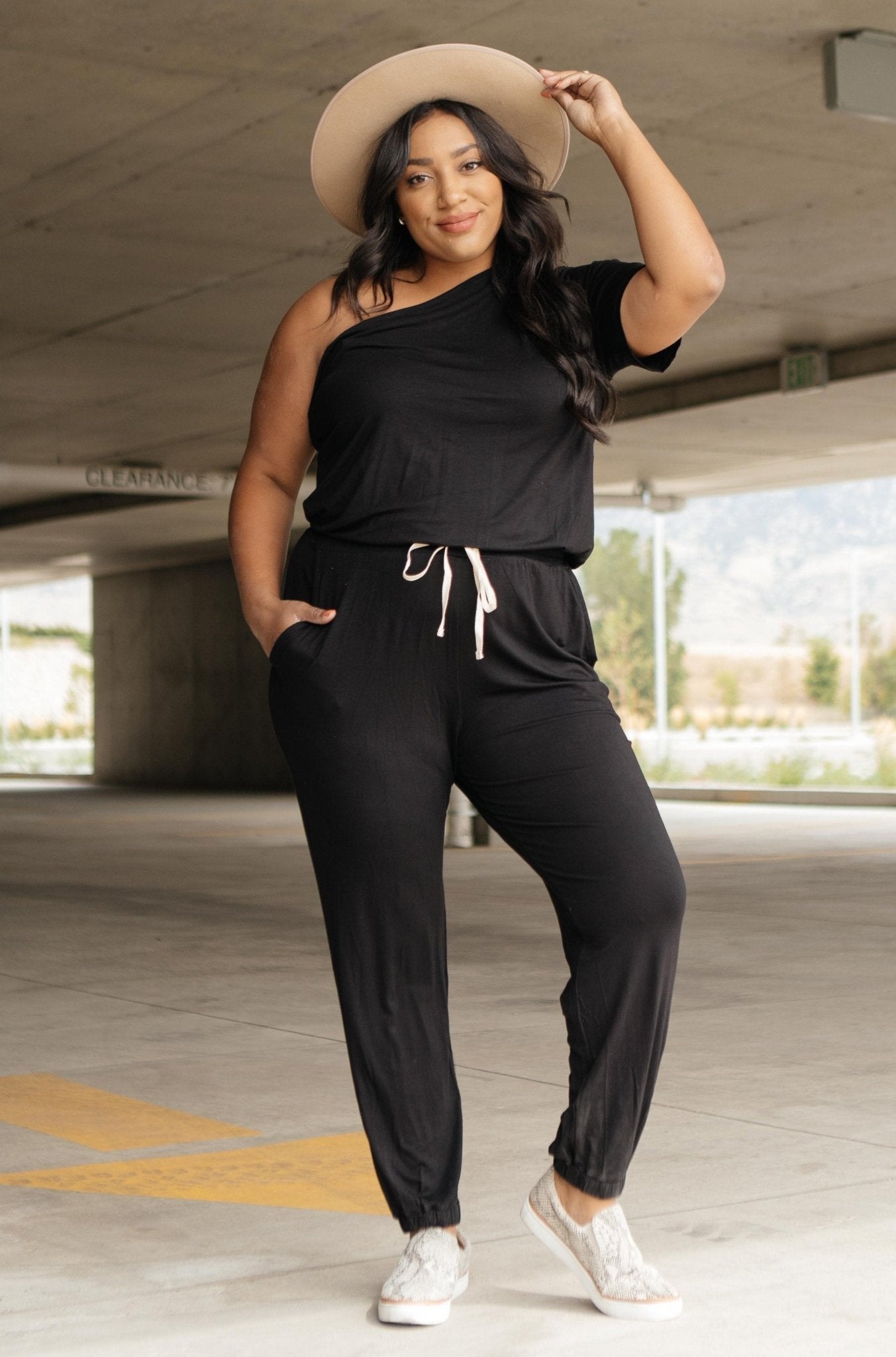 Arm And A Leg Jumpsuit In Black (Online Exclusive) - Uptown Boutique Ramona