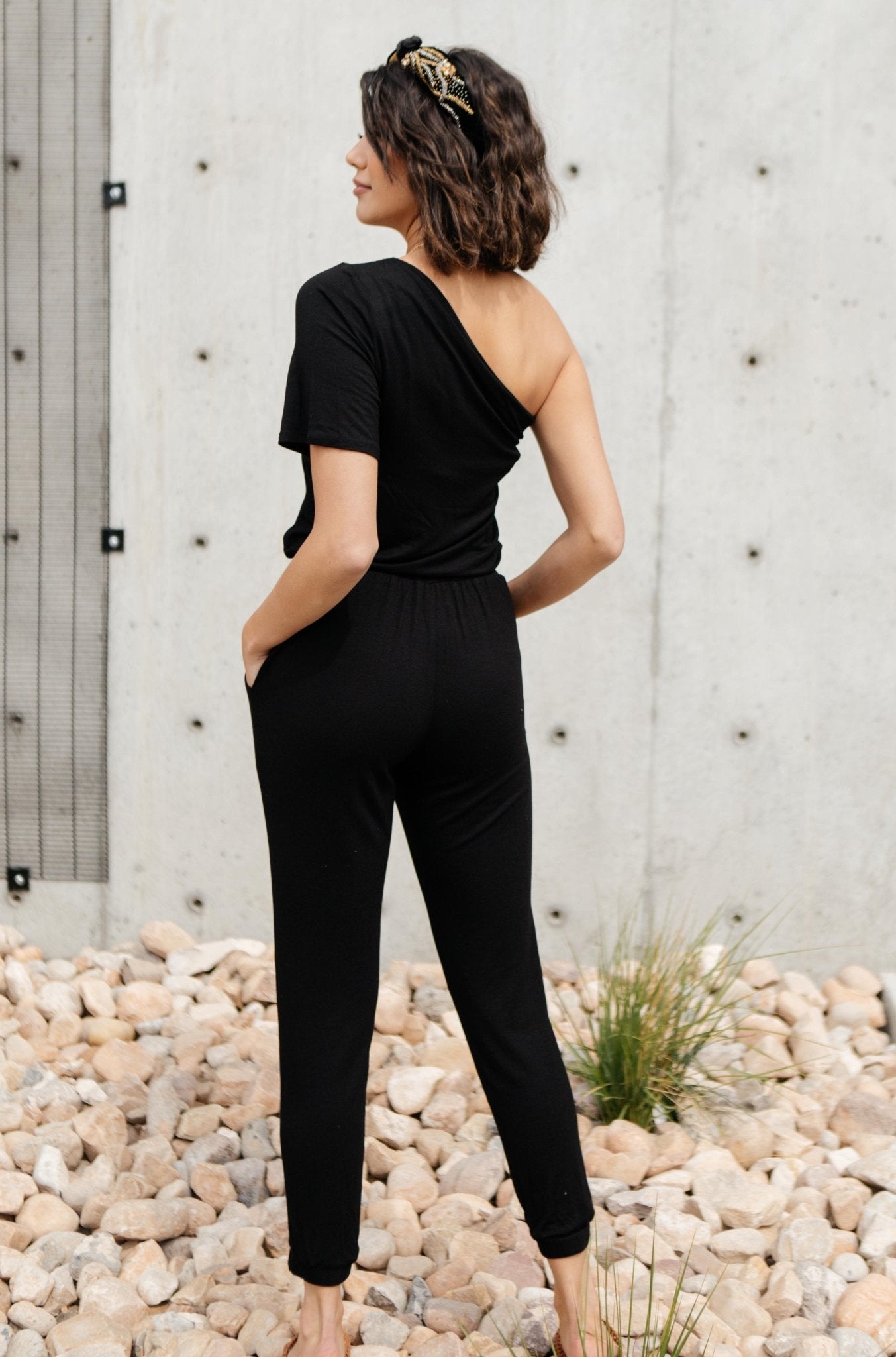 Arm And A Leg Jumpsuit In Black (Online Exclusive) - Uptown Boutique Ramona