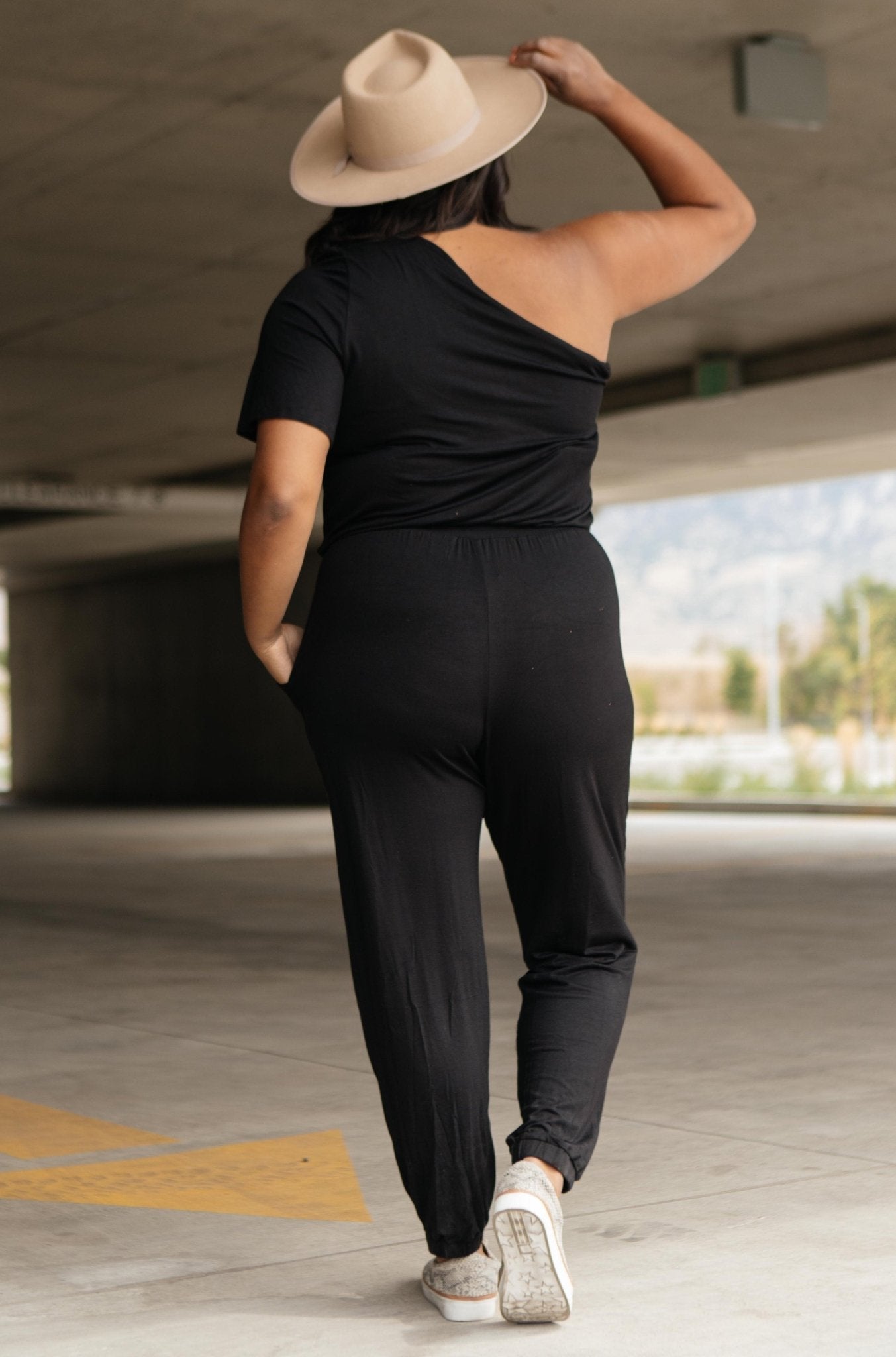 Arm And A Leg Jumpsuit In Black (Online Exclusive) - Uptown Boutique Ramona