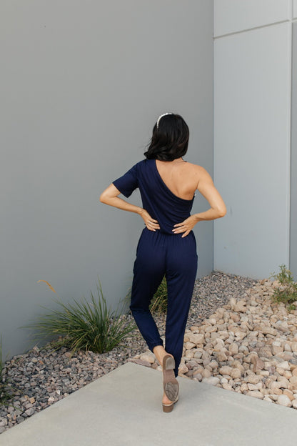 Arm And A Leg Jumpsuit In Navy (Online Exclusive) - Uptown Boutique Ramona