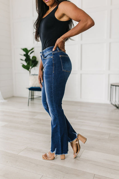 Charity Mid Rise Distressed Hem Bootcut Jeans (Online Exclusive) - Uptown Boutique Ramona