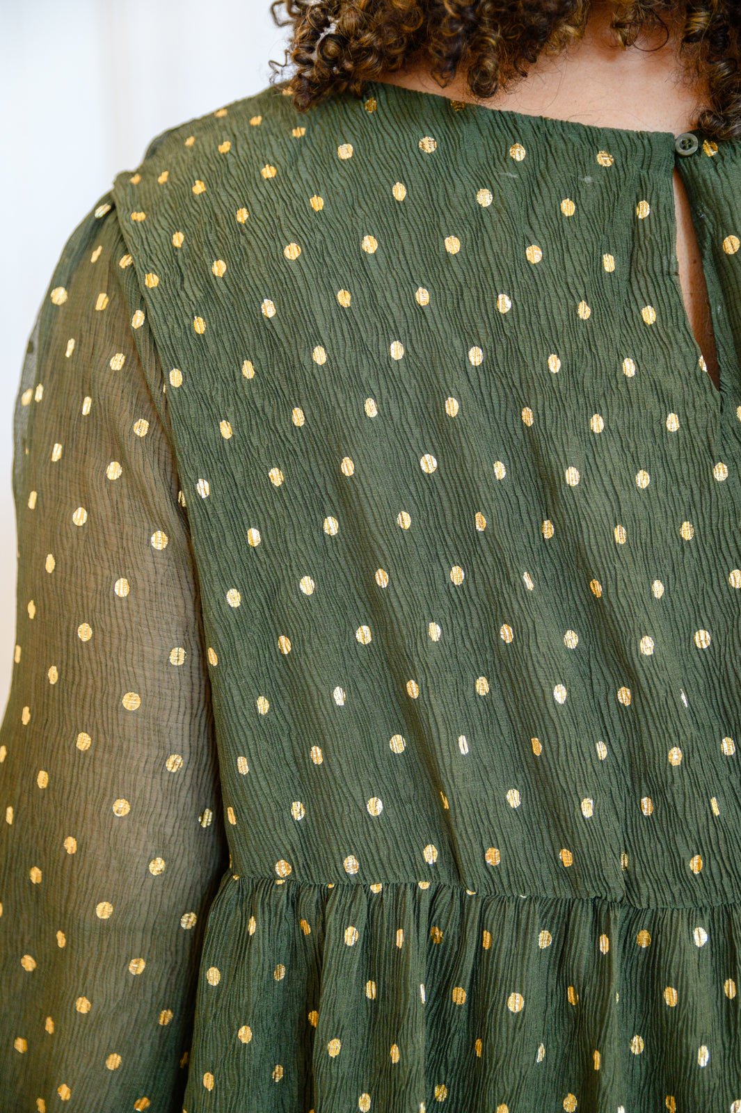 Coya Metallic Dot Tiered Blouse in Olive (Online Exclusive) - Uptown Boutique Ramona