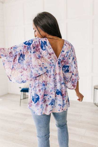 Fabled in Floral Draped Peplum Top in Blue (Online Exclusive) - Uptown Boutique Ramona