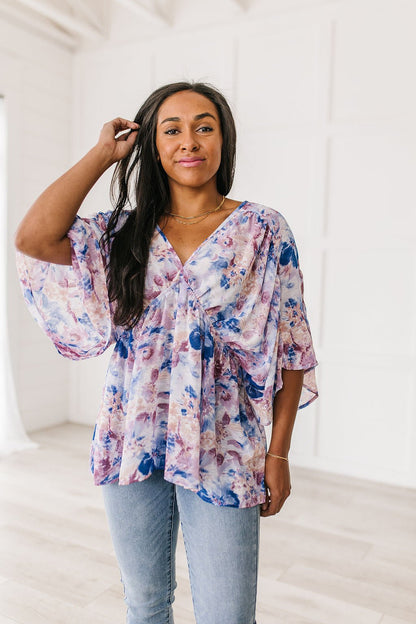 Fabled in Floral Draped Peplum Top in Blue (Online Exclusive) - Uptown Boutique Ramona