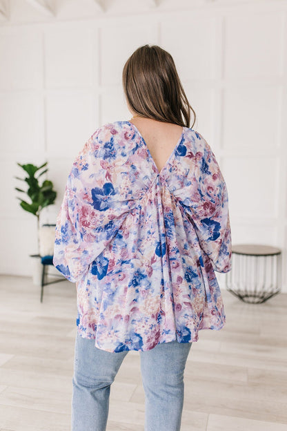 Fabled in Floral Draped Peplum Top in Blue (Online Exclusive) - Uptown Boutique Ramona