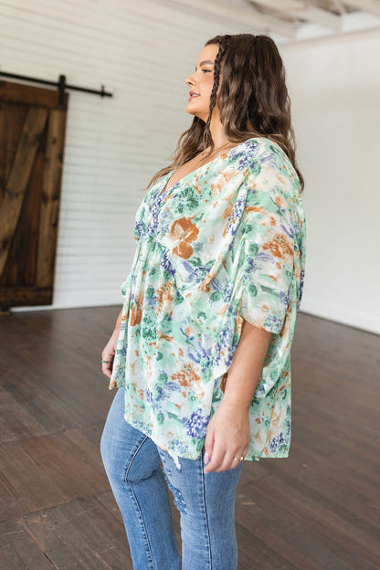 Fabled in Floral Draped Peplum Top in Ivory (Online Exclusive) - Uptown Boutique Ramona