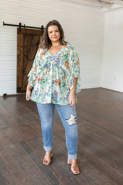 Fabled in Floral Draped Peplum Top in Ivory (Online Exclusive) - Uptown Boutique Ramona