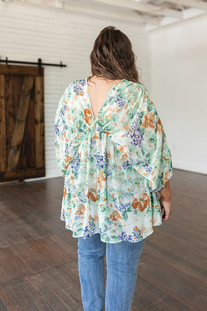 Fabled in Floral Draped Peplum Top in Ivory (Online Exclusive) - Uptown Boutique Ramona