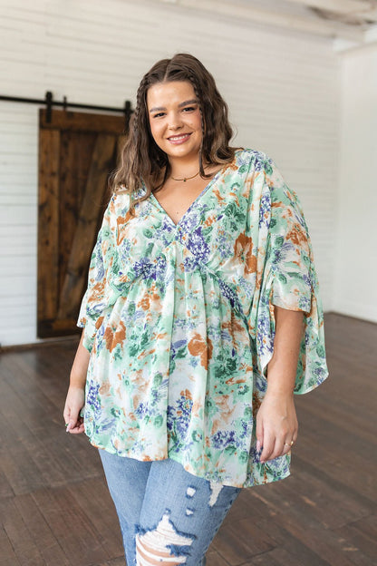 Fabled in Floral Draped Peplum Top in Ivory (Online Exclusive) - Uptown Boutique Ramona