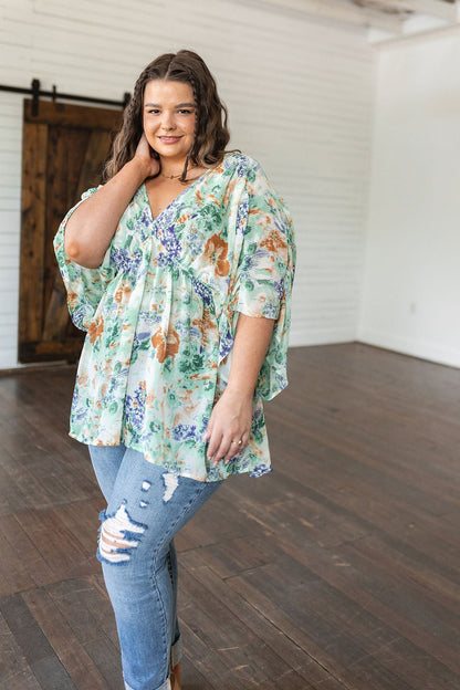 Fabled in Floral Draped Peplum Top in Ivory (Online Exclusive) - Uptown Boutique Ramona