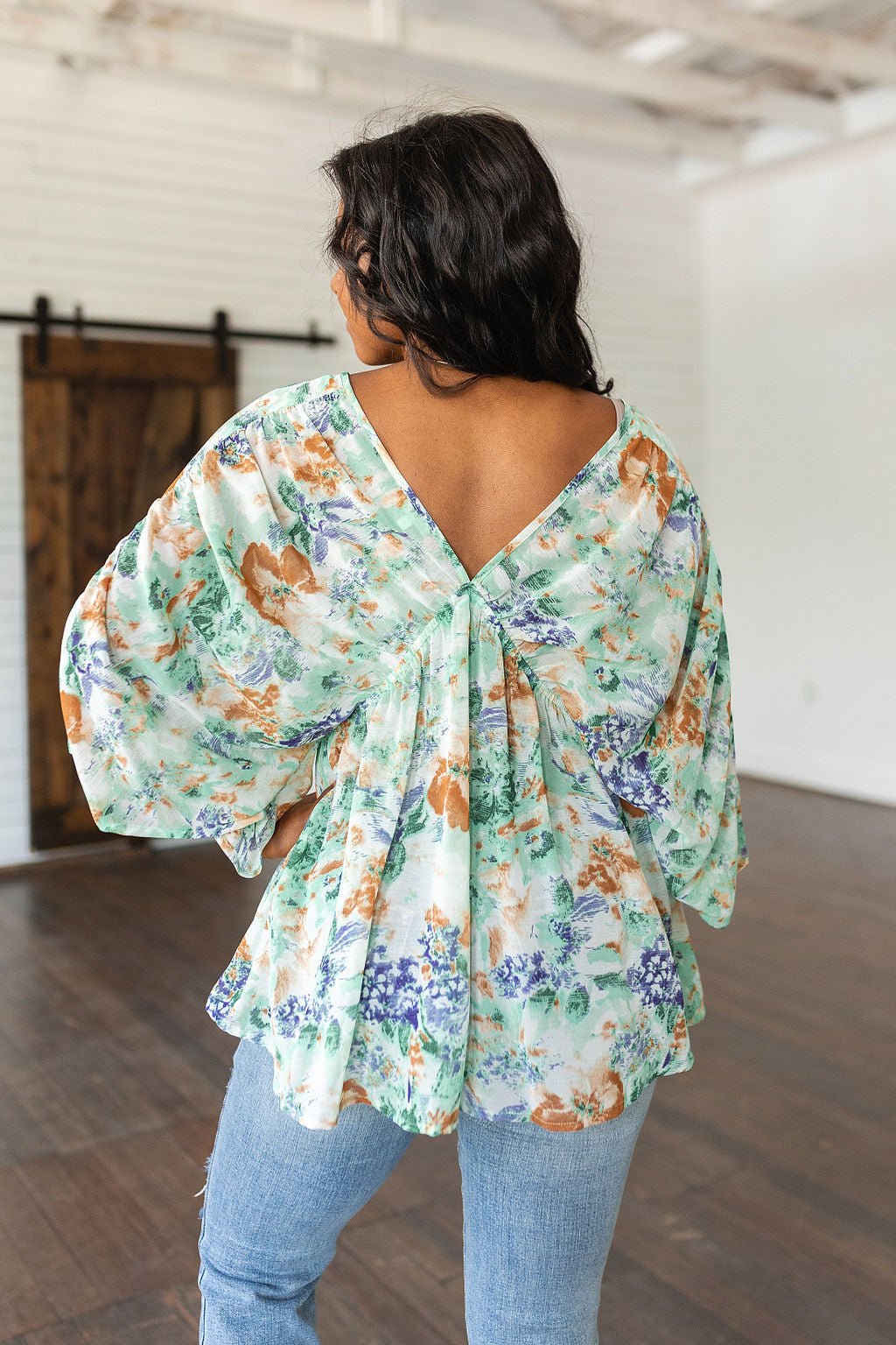 Fabled in Floral Draped Peplum Top in Ivory (Online Exclusive) - Uptown Boutique Ramona