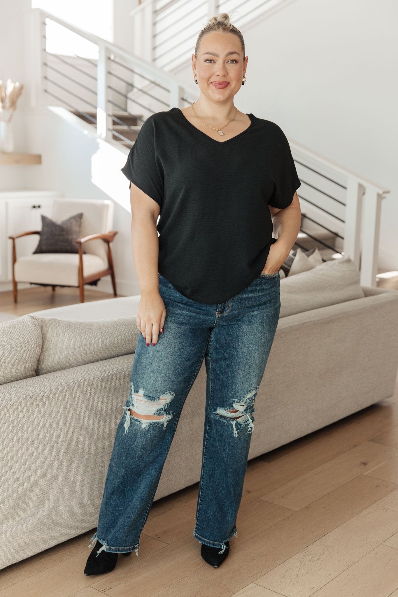 Frequently Asked Questions V - Neck Top in Black (Online Exclusive) - Uptown Boutique Ramona