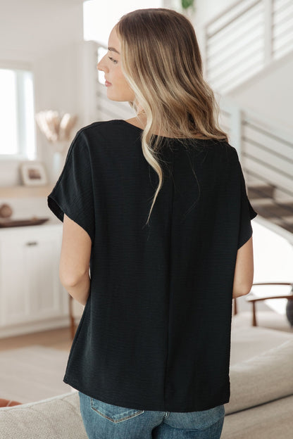 Frequently Asked Questions V - Neck Top in Black (Online Exclusive) - Uptown Boutique Ramona