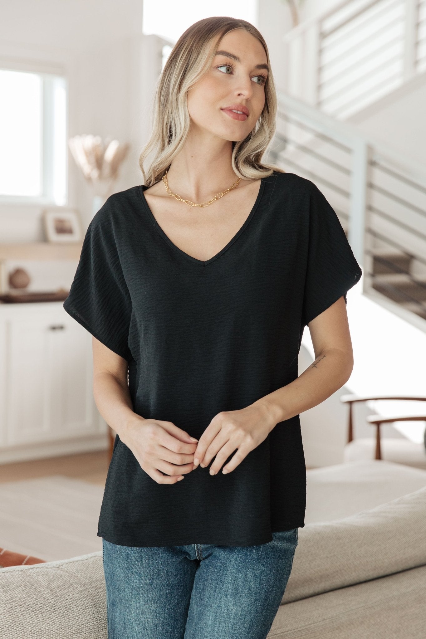 Frequently Asked Questions V - Neck Top in Black (Online Exclusive) - Uptown Boutique Ramona