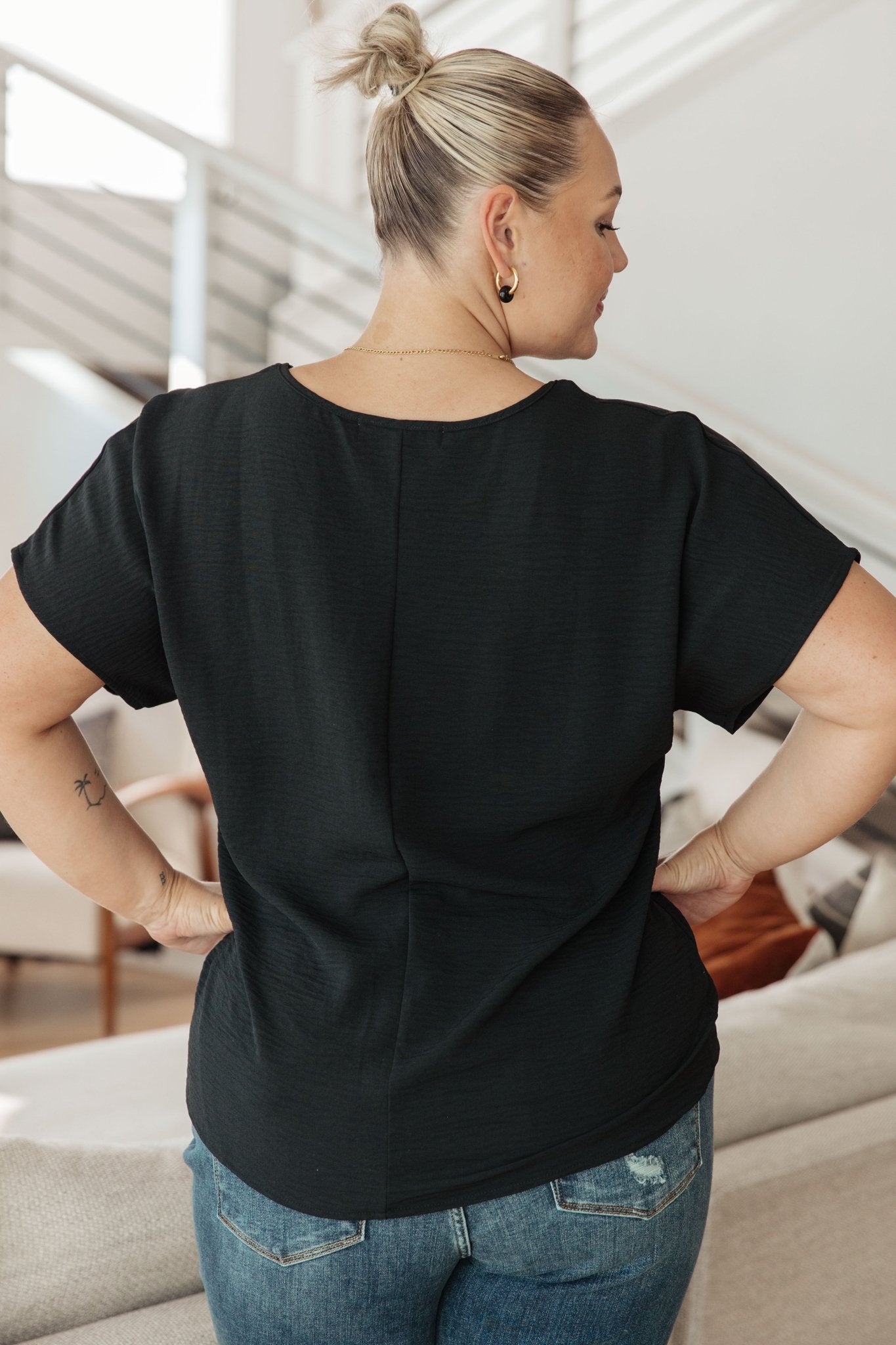 Frequently Asked Questions V - Neck Top in Black (Online Exclusive) - Uptown Boutique Ramona