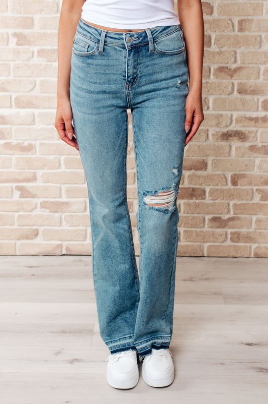 Isla Mid Rise Distressed Released Hem Bootcut Jeans (Online Exclusive) - Uptown Boutique Ramona