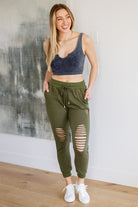 Kick Back Distressed Joggers in Olive (Online Exclusive) - Uptown Boutique Ramona