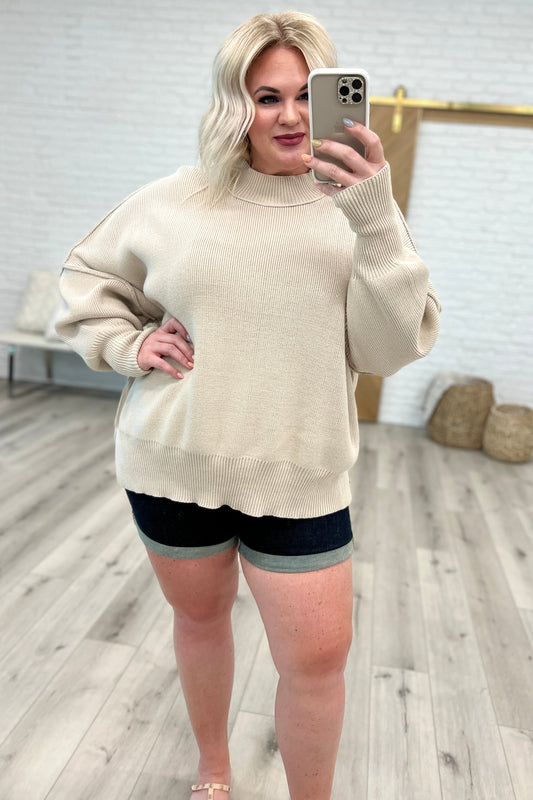 Suéter extragrande con abertura lateral Margot en beige arena (exclusivo en línea)