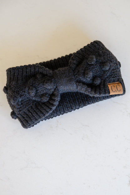 Couvre-chef en tricot à pompons noir (exclusivité en ligne)
