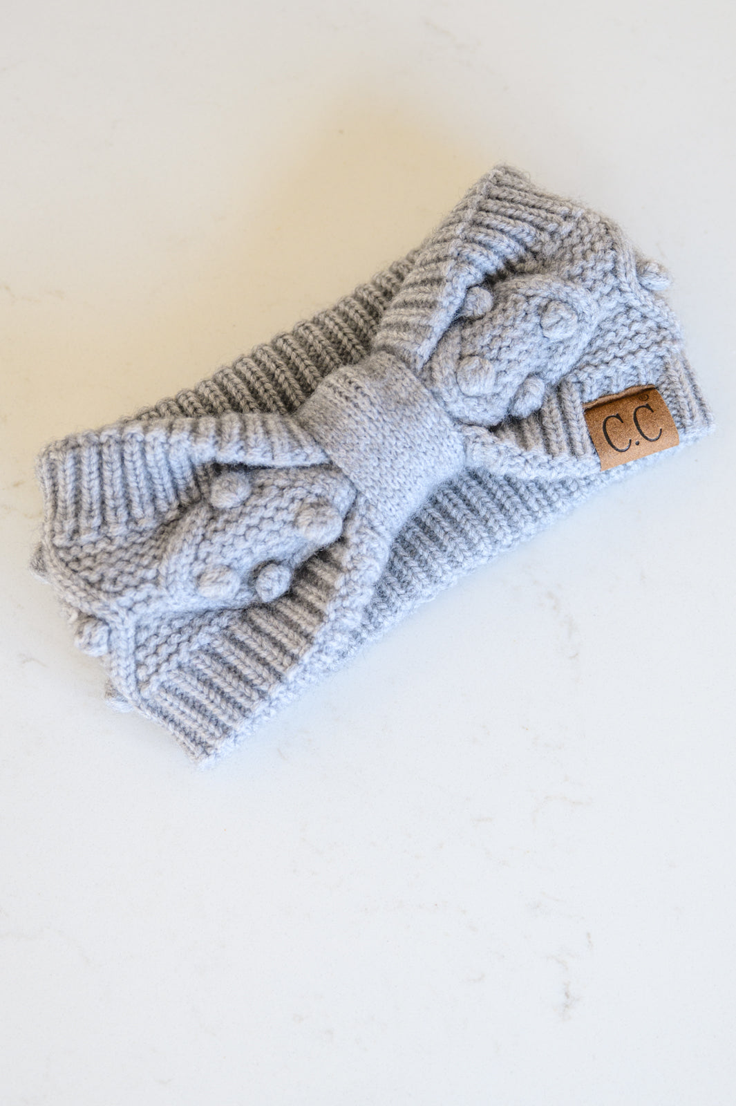 Couvre-chef en tricot à pompons gris (exclusivité en ligne)