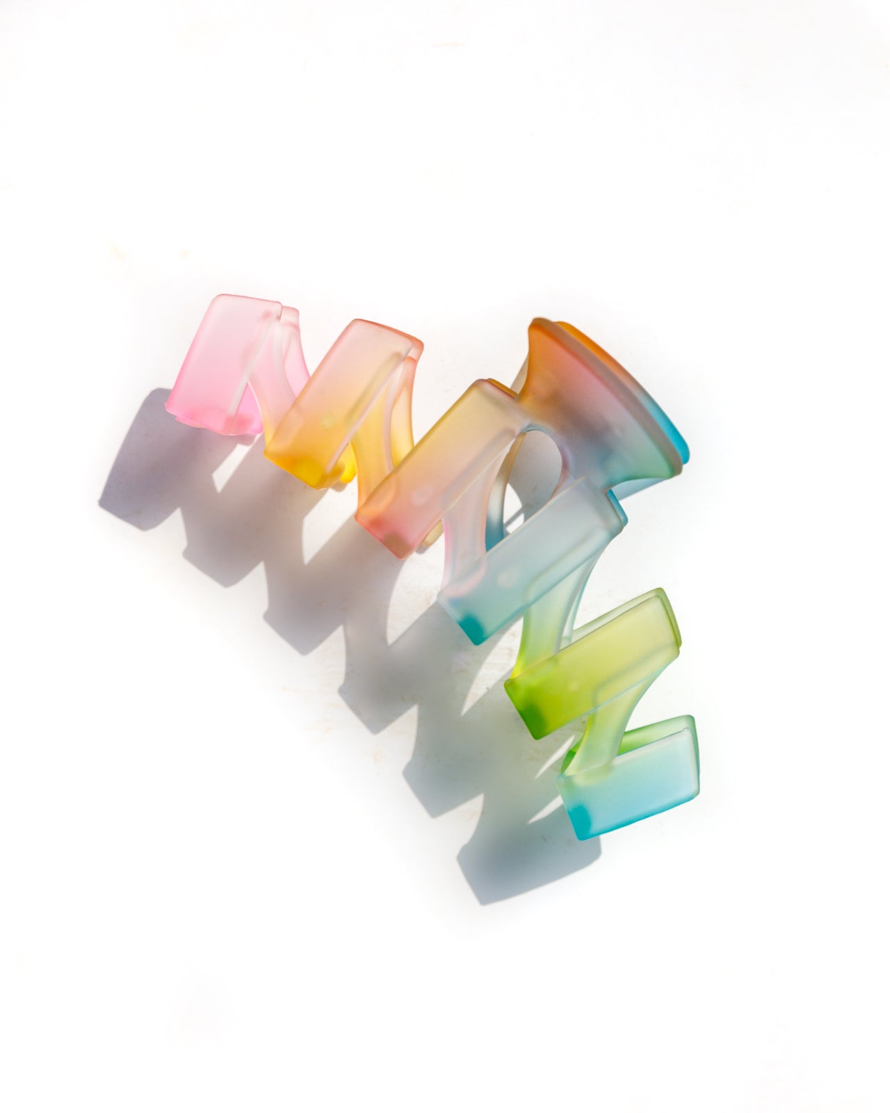 Juego de 4 clips con forma de garra de gelatina arcoíris (exclusivo en línea)