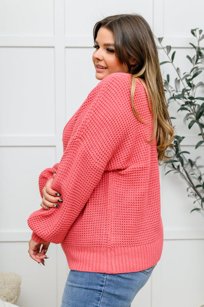 Pull en tricot gaufré à large col en V en rose (exclusivité en ligne)