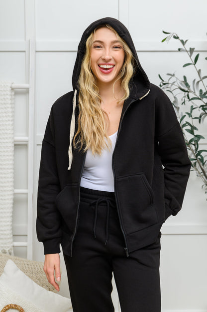 Conjunto de chaqueta con capucha y joggers con cremallera en negro (exclusivo en línea)